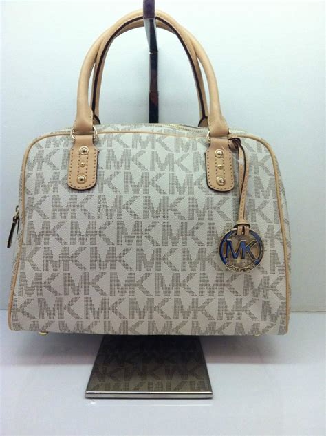 bolsa michael kors blanca original precio|bolsas originales Michael Kors.